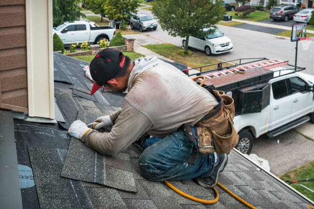 Professional Flat Roof Repair technician working in Feesburg, OH